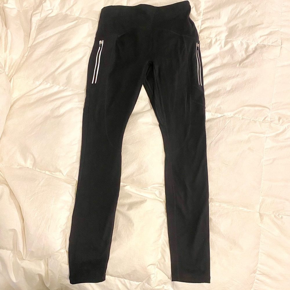 Motion 365 by fabletics running leggings with two reflective zipper pockets